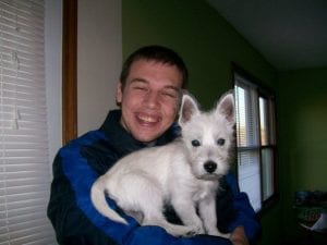 dan-with-lily-puppy-new Our Founder Dan with Lily
